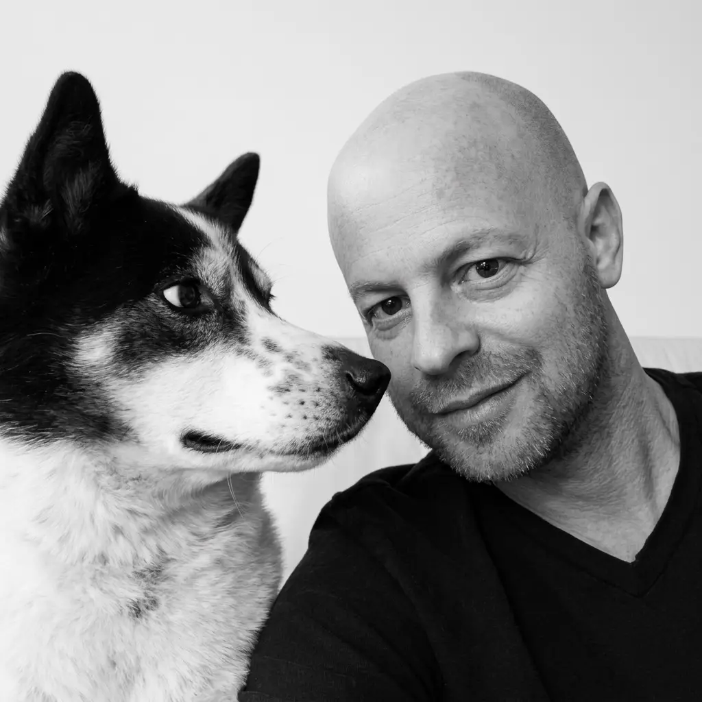 Marc Cooper with a dog in his care